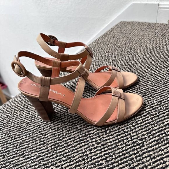 This is a pair of women's sandals in a light brown color. - Picture 2 of 4